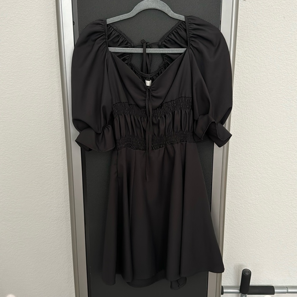 Black puff sleeve mini dress. Like new condition.